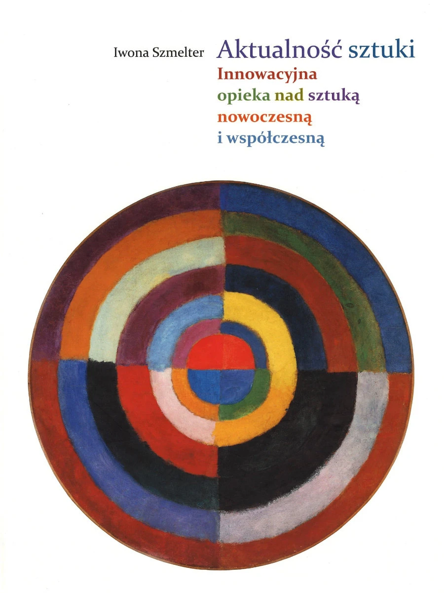 Na białej okładce widoczny jest wielobarwny okrąg, a nad nim tytuł publikacji