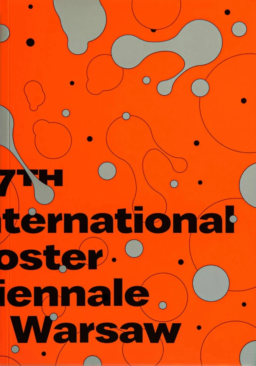 Okładka w pomarańczowym kolorze przedstawiająca nieregularne kształty